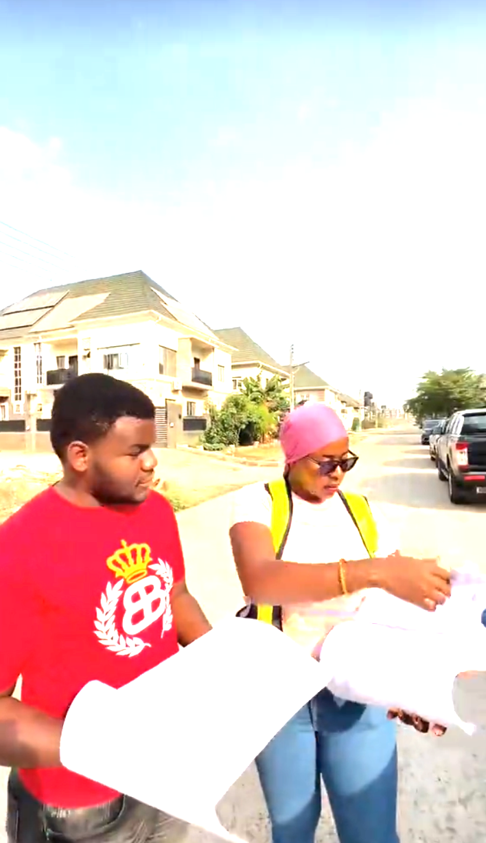 Saida on a residential construction site reviewing drawings